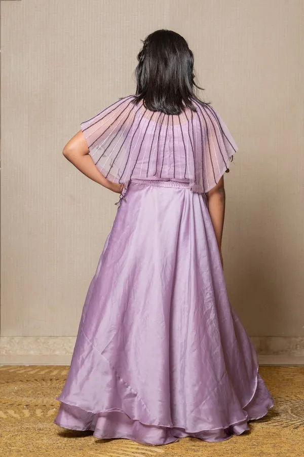 Elegant Lavender ensemble with a beaded cape and layered skirt, perfect for a graceful and sophisticated look at any special occasion.