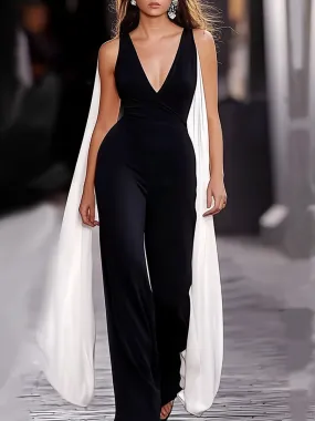 Stunning Black Plunge Neck  with White Cape Overlay Jumpsuit